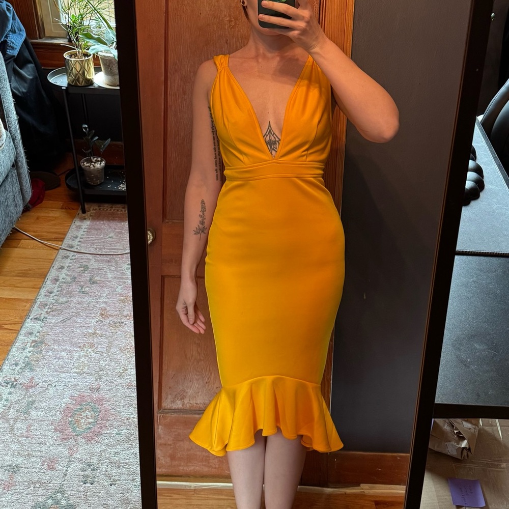 Yellow midi dress from the SHEIN Frida Kahlo Collection in U.S. size M